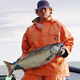 fisherman with salmon